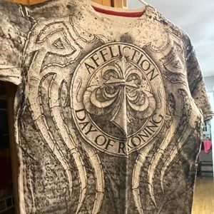 Men’s small affliction graphic shirt.
